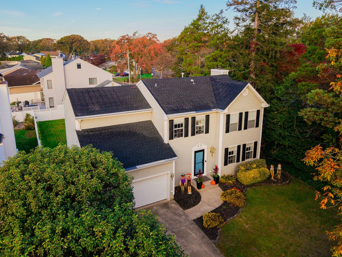 Colonial home roof replacement in Toms River — after