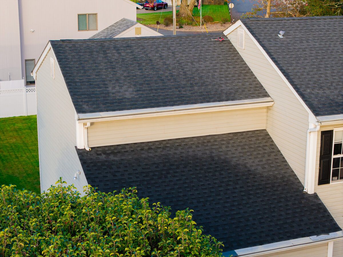 Finished roofing project on a large New Jersey suburban home